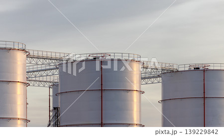 Oil storage tank, White Oil storage fuel tank with oil pipeline system in petrol industry, Oil storage tank at oil and gas refinery industrial zone. 139229842