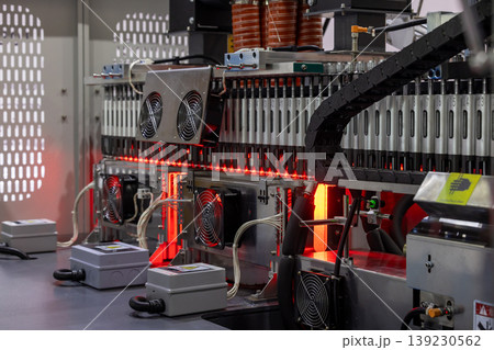 Automatic glass bottle inspection machine, Automation machine in modern factory technology demonstration bottles in the industry, High speed inspection. Automatic glass bottle inspection machine, Automation machine in modern factory technology demonstration bottles in the industry, High speed inspection. 139230562