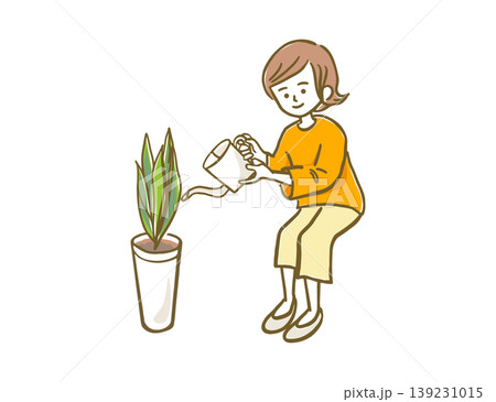 観葉植物に水やりをする女性 139231015