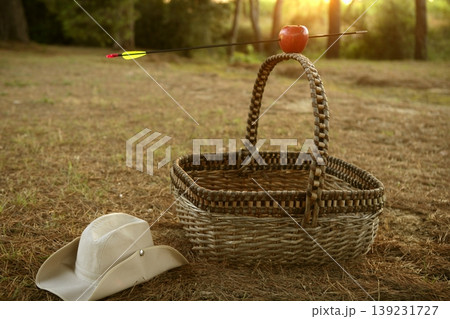 William tell metaphor with red apple and arrow William tell metaphor with red apple and arrow 139231727