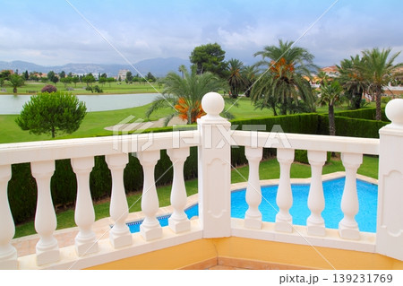 Golf course from pool housel white balustrade 139231769