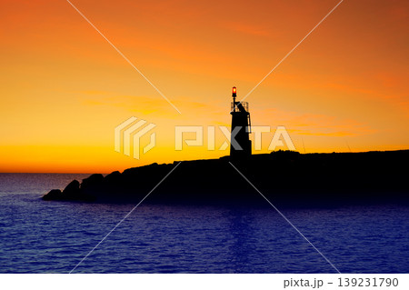Golden sunrise sunset in sea red beacon lighthouse Golden sunrise sunset in sea red beacon lighthouse 139231790