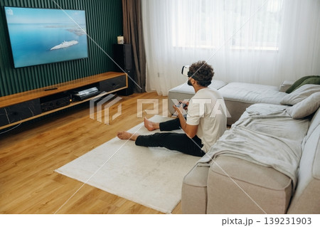 Man is in the modern domestic room at home Man is in the modern domestic room at home 139231903