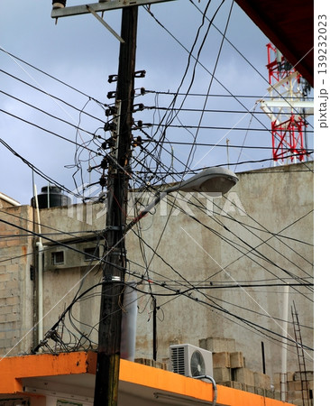 messy electric cables wooden pole busy skyscape messy electric cables wooden pole busy skyscape 139232023