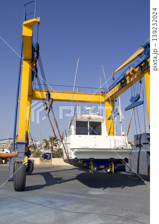 boat crane travelift lifting motorboat 139232024