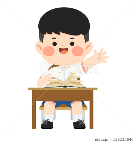 Boy Raising Hand At Desk With Book In Classroom 139233846