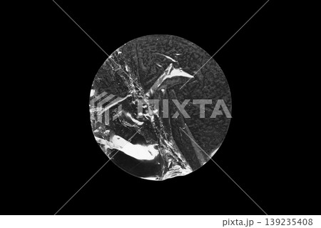 transparent adhesive round plastic sticker label isolated on black background transparent adhesive round plastic sticker label isolated on black background 139235408