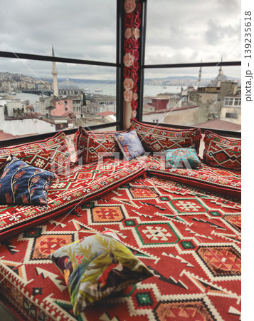 Traditional rooftop lounge with oriental carpets and panoramic view of Istanbul Turkey Traditional rooftop lounge with oriental carpets and panoramic view of Istanbul Turkey 139235618