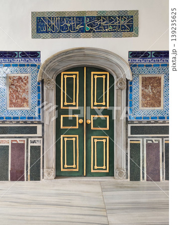 Ornate green and gold door with Iznik tiles in the Harem of Topkapi Palace Istanbul Turkey Ornate green and gold door with Iznik tiles in the Harem of Topkapi Palace Istanbul Turkey 139235625