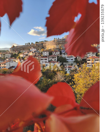 Safranbolu old town panorama framed by red autumn leaves Safranbolu old town panorama framed by red autumn leaves 139235879