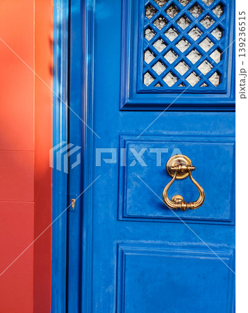 a beautiful decorative doorknob for knocking on an old door a beautiful decorative doorknob for knocking on an old door 139236515