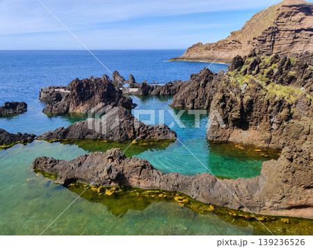 beautiful rocky mountains by the sea on the island of Madeira in Portugal beautiful rocky mountains by the sea on the island of Madeira in Portugal 139236526