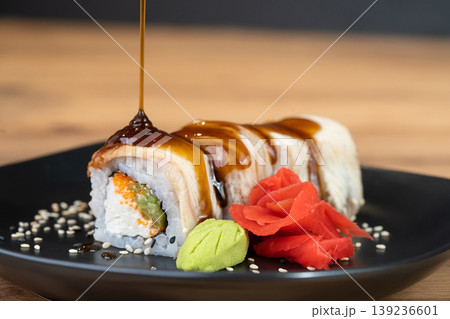 delicious traditional Japanese sushi and rolls on a plate to pour sauce 139236601