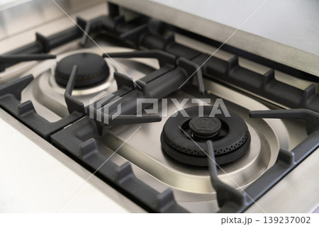 Close-up of a modern stainless steel gas stove top 139237002
