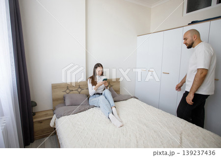Portrait of couple spending time together at home Portrait of couple spending time together at home 139237436