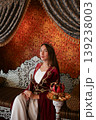 Young girl in traditional Turkish costume sitting with hookah in luxury oriental interior 139238003