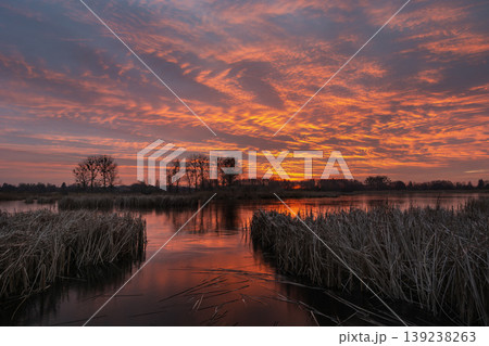 Fantastic sunset over the frozen lake Fantastic sunset over the frozen lake 139238263