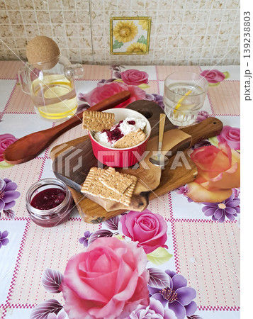 Cottage cheese with jam and biscuits, cozy food scene Cottage cheese with jam and biscuits, cozy food scene 139238803