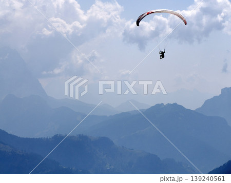 paragliding in dolomites mountains 139240561