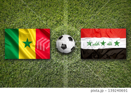 Senegal vs. Iraq flags on a soccer field Senegal vs. Iraq flags on a soccer field 139240691