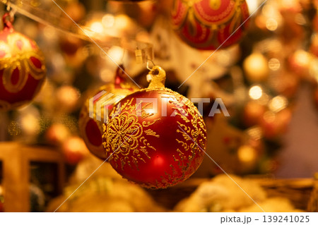 Beautiful Christmas baubles with traditional ornaments, cozy and warm Christmas card Beautiful Christmas baubles with traditional ornaments, cozy and warm Christmas card 139241025