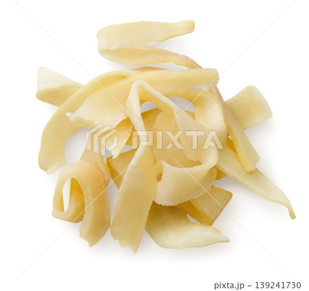 Pile of dried squid pieces close-up on a white background. Top view 139241730