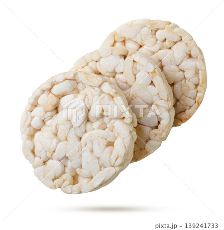 Rice cakes flying close-up on a white. Isolated 139241733