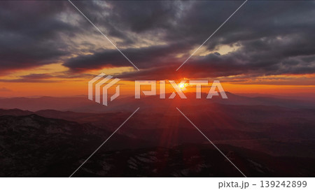 Sunset over mountain with dramatic clouds 139242899