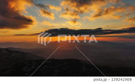 Sunset over mountain with dramatic clouds 139242909