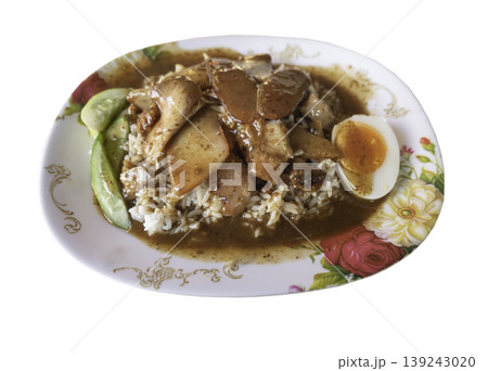 Isolated on a white background with a clipping path, this expertly prepared Khao Moo Daeng features tender slices of honey-roasted red pork and crispy belly over fluffy jasmine rice. A decadent, Isolated on a white background with a clipping path, this expertly prepared Khao Moo Daeng features tender slices of honey-roasted red pork and crispy belly over fluffy jasmine rice. A decadent, 139243020