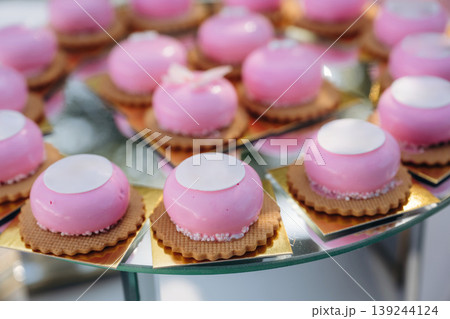 Pink color, cute design. Detailed close up view of bunch of delicious sweets, celebration event 139244124