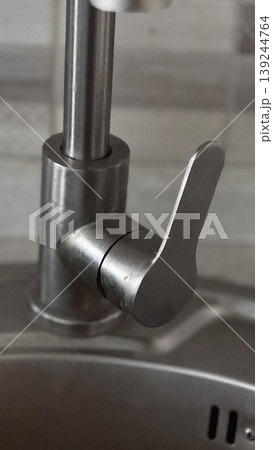 Modern Kitchen Faucet Handle Close-Up for Home Design 139244764
