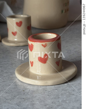 Charming Handmade Ceramic Cup with Heart Designs 139244967