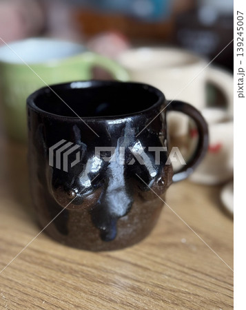 Unique Artistic Black Mug with Abstract Design for Home Decor 139245007