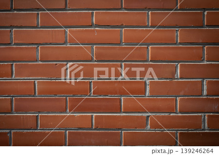 Weathered brick with mortar lines. Old brick wall with uniform lighting and subtle shadows Weathered brick with mortar lines. Old brick wall with uniform lighting and subtle shadows 139246264