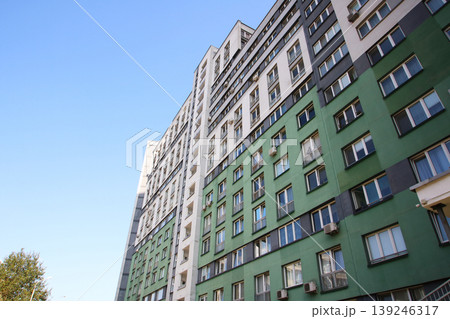 City building exterior. Urban residential facade details. Street view of apartment complex City building exterior. Urban residential facade details. Street view of apartment complex 139246317
