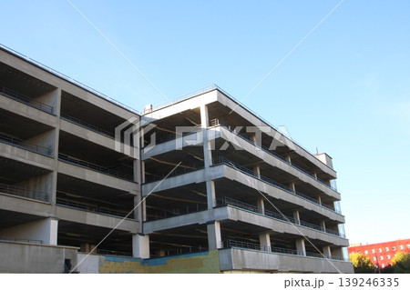 City infrastructure showcasing raw concrete texture with dramatic lighting effects and open design 139246335