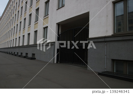 Quiet cityscape showcasing regular window layouts and safeguarded entry points for simplicity 139246341