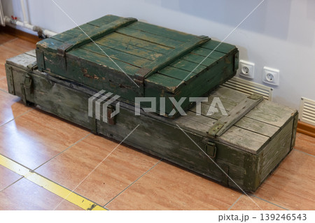 Stacked weathered green wooden crates for ammunition Stacked weathered green wooden crates for ammunition 139246543