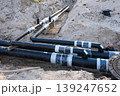 Insulated underground pipeline connections in trench for district heating utility installation site 139247652