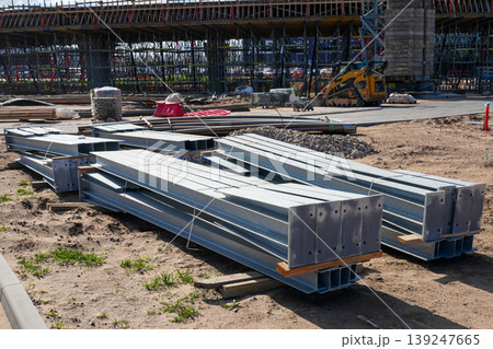 Structural steel beams prepared at bridge construction site for major infrastructure development work 139247665