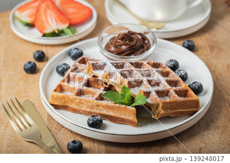 Belgium waffles Homemade waffles with strawberries Belgium waffles Homemade waffles with strawberries 139248017