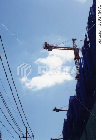 Construction Site with Cranes and Building Under Construction Construction Site with Cranes and Building Under Construction 139248471