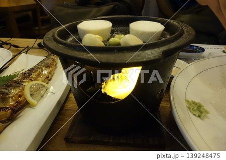 Hot Pot with Fish and Vegetables on Dining Table Hot Pot with Fish and Vegetables on Dining Table 139248475