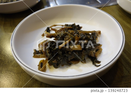Stir-Fried Greens with Bamboo Shoots in Bowl 139248723