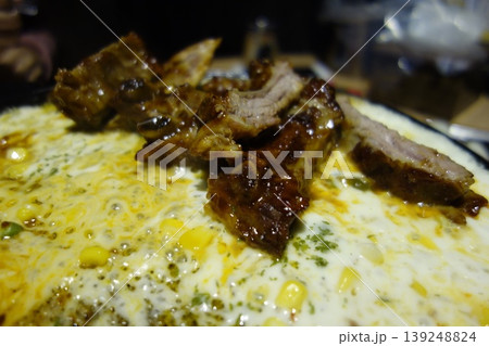 Grilled Ribs with Corn on a Plate 139248824