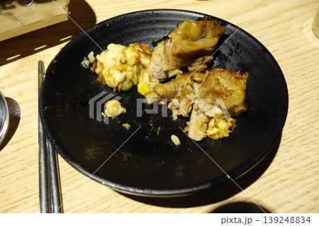 Grilled Meat and Side Dish on Black Plate 139248834