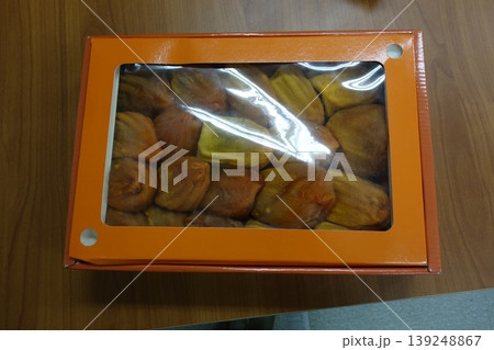 Orange Box with Dried Fruits Inside 139248867