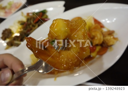 Glistening Honey Glazed Shrimp on Fork 139248923