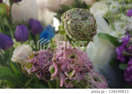 Elegant Floral Bouquet with Pastel and Purple Blooms 139249013